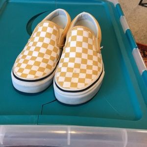 Checkerboard slip on vans